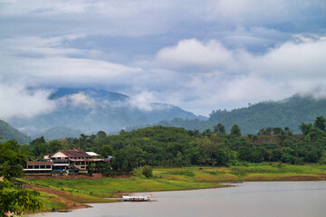 Obraz premium Serene Mountain Lake Village