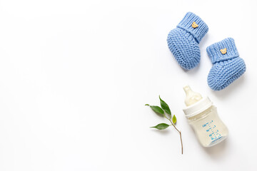 Baby kids flat lay with milk in bottle, top view