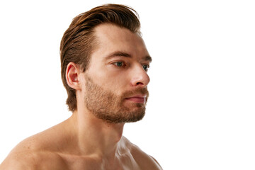 Obraz premium Portrait of handsome man with well-kept skin and hair, showing importance to take care after appearance isolated on white background. Concept of male beauty, skin care, cosmetology, cosmetics