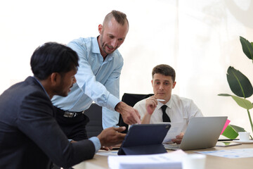 Business meeting, group of business executives meeting to discuss planning the collaboration of people in the company. Teamwork meeting business people in office workplace.