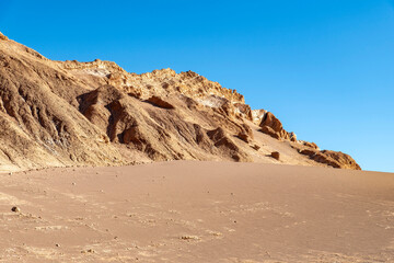 Valle de la Luna (Valley of the Moon) with stone, sand and salt formations carved by wind and water in Atacama Desert near San Pedro de Atacama, Antofagasta, Chile like surface of the Moon