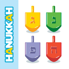 Colored toy Dreidels a traditional Hanukkah game. Set of plastic spinning top with Hebrew letters meaning 