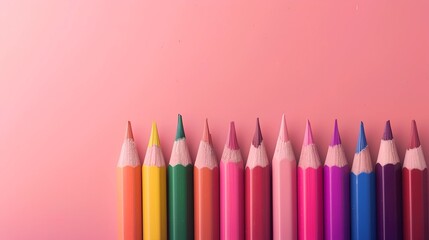 coloured pencils on a plain pink background with space for text
