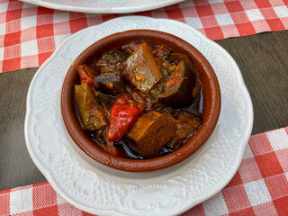 Traditional French dish ratatouille with steamed vegetables in a plate high angle view