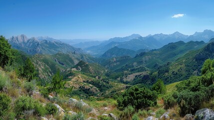 Naklejka premium Panoramic view of majestic mountains under a clear sky. Breathtaking natural landscape.