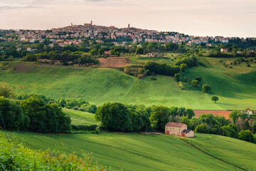 Spring wiev of city Corridonia in Marche region during sunset.