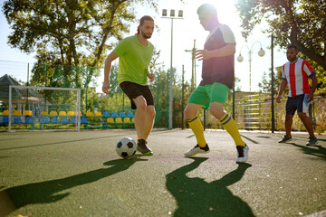 Street football on city soccer field © Nomad_Soul