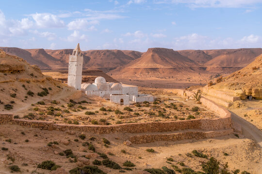 Mosque of the Seven Sleepers in Chenini Tataouine, Tunisia, a Berber Muslim church in dry mountain landscape of Sahara desert.
