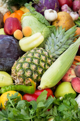 Plant background with ripe fruits, vegetables, berries and herbs. Concept of fertility and good harvest, close-up