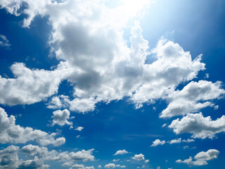 Rainy season sky and clouds with sunlight shining through.