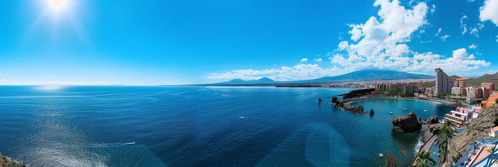 Obraz premium Coastal Cityscape of Santa Cruz de Tenerife with Blue Ocean and Mountains