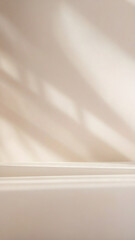 Background image for design or product presentation, with a play of light and shadow, in light, warm neutral tones	