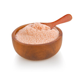 Himalayan salt in wooden bowl and spoon isolated on white background