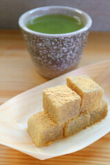 Warabimochi, Japanese Traditional Confection with a Cup of Hot Matcha Green Tea