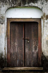 The door of an old building is closed