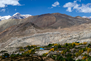 Beautiful mountain scenery. River, valley, snow, blue sky, white clouds. In-depth trip on the Sonamarg Hill Trek in Jammu and Kashmir, India