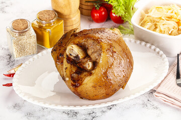 Baked pork knee with spices