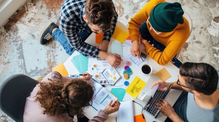 Obraz premium A team of designers collaborating on a user experience project