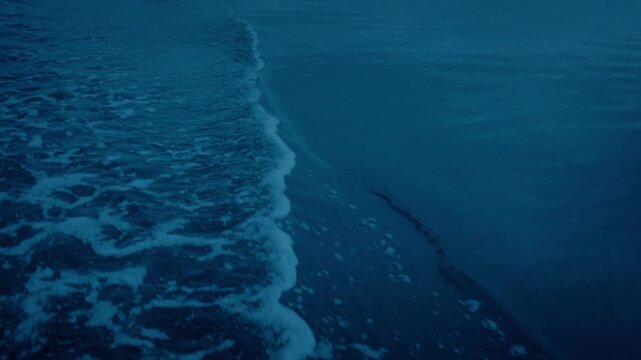 Wake Behind Boat On Calm Water
