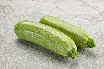 Raw green ripe zucchini vegetable