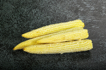 Raw sweet baby corn heap