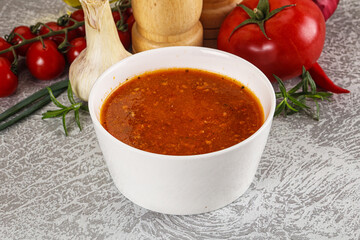 Hot tomato soup with diced chicken