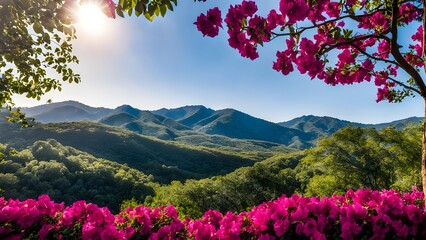 A mountain range with a beautiful pink flower garden in the foreground