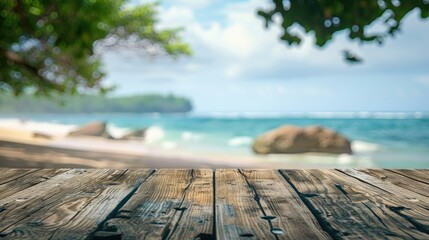 Fototapeta premium Blurry image of wooden terrace and scenic beach for background purpose