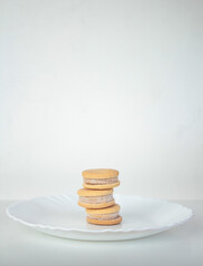 Minimalist composition with biscuits on white background. Front view.