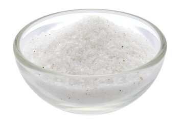 Sea salt with specks of dried seaweed in a glass bowl isolated on white.