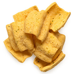 Pile of lentil chips isolated on white from above.