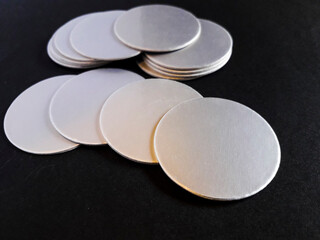 Aluminum foil induction seal isolated black background