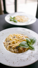 Carbonara with mushrooms, pasta with cream sauce