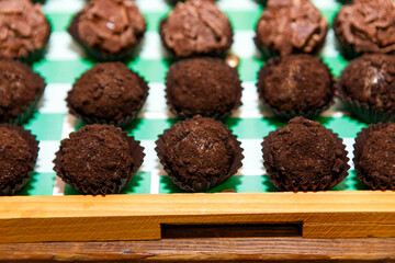 Tray with chocolate brigadeiro, a typical Brazilian sweet.