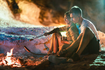 Couple On The Beach at Night