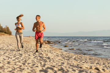 Couple Running Near The Sea
