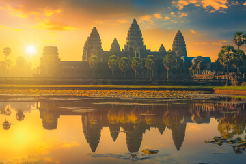 Fototapeta premium The ancient city of Angkor Wat in Cambodia at sunrise.