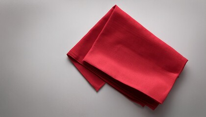 top view with red empty kitchen napkin isolated on table background Folded cloth for mockup with copy space Flat lay Minimal style