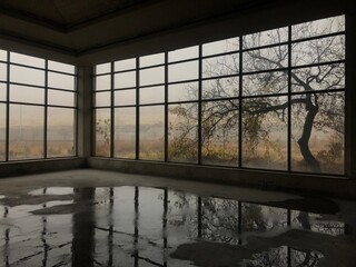 Empty Industrial Space with Foggy Windows and Reflections