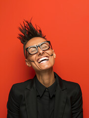Fototapeta premium a punk style adult woman, tattooed on both cheeks is laughing happily