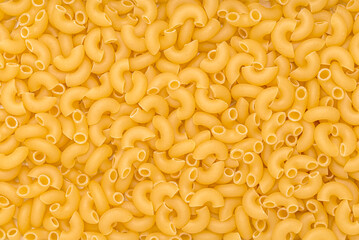 Macro photography of macaroni; pasta; noodles; raw; italian; durum; wheat; semolina; traditional; vegetarian; natural; carbohydrate