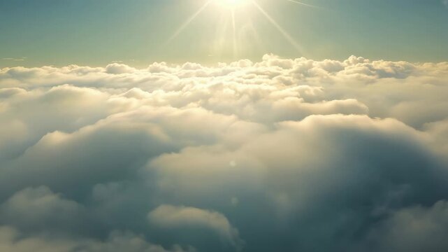 Motion animation of flying through the clouds at sunrise.  Beautiful sunset sky above clouds. Abstract spiritual background. Religion and heaven