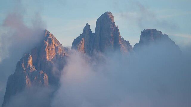 landscape of the mountains during Sunset Cover by clouds. Oragena dn blue colors