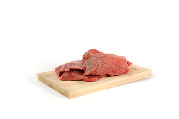 steak raw on wooden cutting board isolated on white 