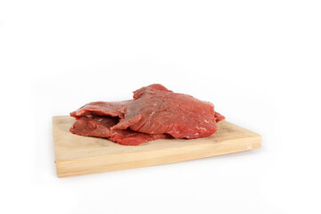 steak raw on wooden cutting board isolated on white 