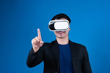 Profile businessman wearing VR headset looking to connect metaverse pointing to choose interesting data isolated blue background futuristic analytics communication tech virtual reality. Contrivance.