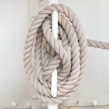 London, England, Great Britain.. Rope tied off in a knot onboard a ship