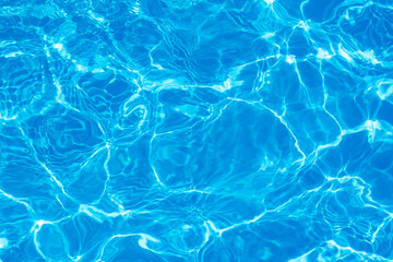 blue surface water in the pool with ripples