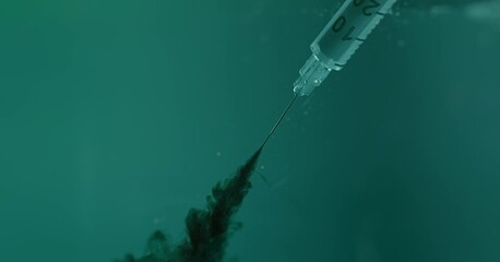Close-Up Syringe Needle With Dark Liquid On Water - Powered by Adobe