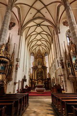 Naklejka premium St. Vitus Church gothic cathedral, national cultural monument in Cesky Krumlov, south Bohemia region of Czech Republic